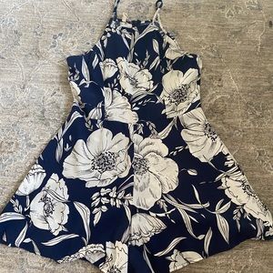 navy blue and white floral romper